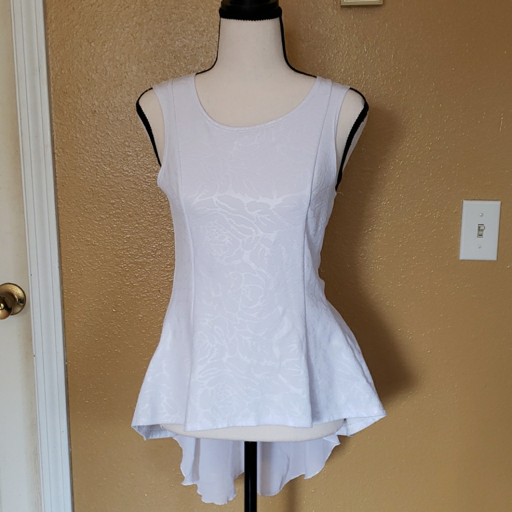 Short front/longer lace train in the back.